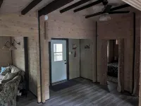 Riverside cabin in the woods