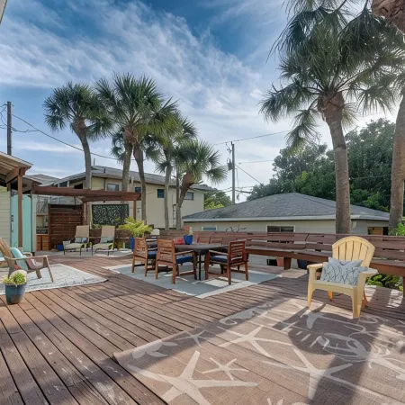 Large 3/3 pet friendly house across the street from the beach.