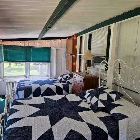 Cozy family cottage w/ fireplace, near lake and national forest.
