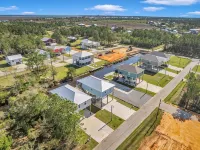 Waterfront Escape in Bay Stl with Dock,Pickleball, Ping Pong, Basketball & More!