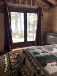 Cozy, Off-Grid Camp on Spectacle Pond w/ private water frontage!