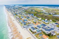 Ocean View, steps from sand, enjoy it all in your spacious 3-bedroom retreat