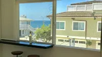 Steps to sand! Ocean view, Walk to village, family friendly, A/C! - homestay