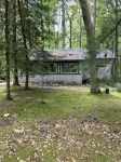 Quaint and cozy log  and knotty pine cabin close to lakes.