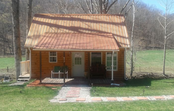Quaint, secluded cabin with the feel of home. Sleeps 4 with home-like amenities.