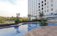 Basic Studio Apartment at Tamansari Skylounge Makassar By Travelio - Apartments
