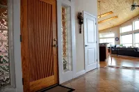 Coastal Elegance: Pet-Free Oceanfront One Level Home with Sweeping Views