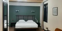 Innwoods Hotel - Habitación Cuádruple Clásica