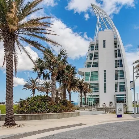 Affordable ONE BR Main Floor Condo RIGHT ON THE BEACH w/ KING Bed & Heated POOL!