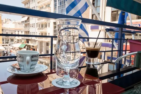 Triton Hotel Piraeus Отели рядом с достопримечательностью «Microlimano»