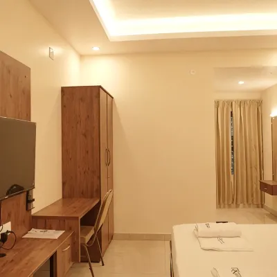 Ganesh Residency Hotels near Athankarai Pallivasal
