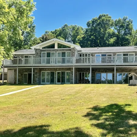 Spacious Lake house with Double Boat Dock & Gently Sloping Lot