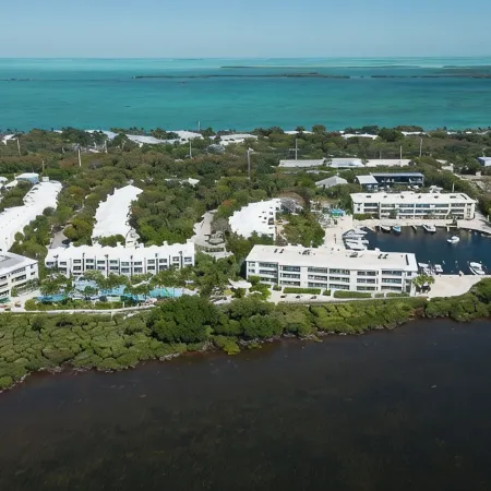 Resort-Style Living at Mariner's Club – Steps from Pools, Marina, & Ocean Views!