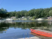 Cottage 1 is a charming 2 bedroom only 25’ from its boat dock & Hamlin lake. - 2-Star
