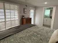 Peaceful lake front home with wrap around porch and relaxing views!