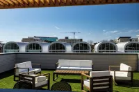 Cultural District Loft, Rooftop Terrace + Games -  Apartamentos vacacionales