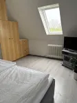 Kleine Ferienwohnung , Direkt am Deich und Hafen von Eckwarden mit Gartennutzung