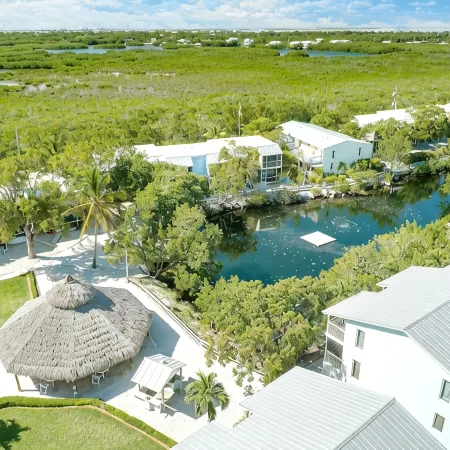 Waterfront - Private Lagoon - in Park on the Ocean side -beach, pool