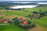 Dworek Mazurski Lizer فنادق في Wegorzewo County