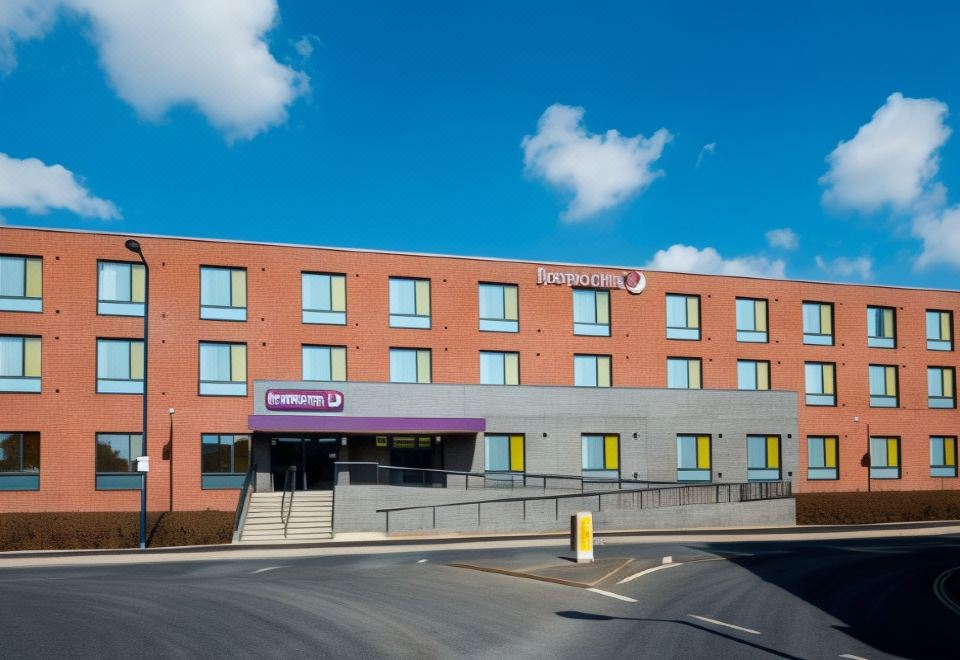 "a large , modern hotel building with a sign that reads "" travelodge "" prominently displayed on its exterior" at Premier Inn Felixstowe Town Centre