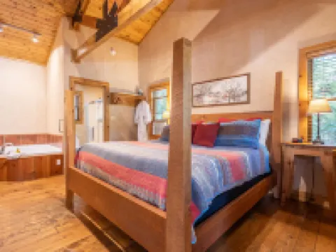 Whirlpool and Cozy Fireplace - Charming Riverbank Sanctuary