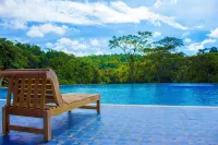 Mookanana Jungle Resort and Spa فنادق في Hassan