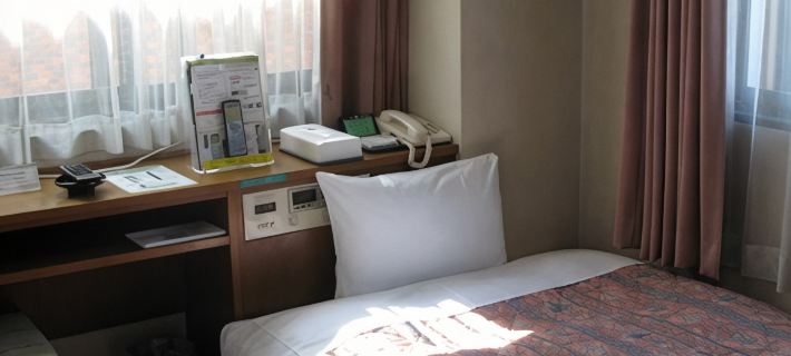 Business Hotel Sunlight Honkan Hoteles en Fuchū
