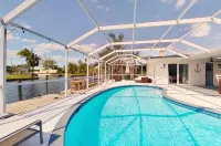Sailors Paradise-Waterfront Gulf & Sailboat access with AC, WIFI, heated Pool! - Homestays