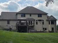Luxury 5 BR home on private wooded lot near QC, w/hot tub, rec & fitness room Hotels in Henry County