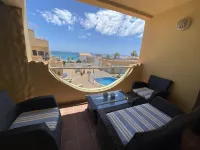 Apartment, dream location, on the sandy beach, WiFi on request, community pool - 2つ星