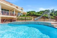 One of Puerto Rico’s Most Stunning 5 bedroom Oceanview Villas with  Pool & Slide - Uima-altaat