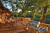 Tranquil Texoma Lake House w/ private lake on .5 acres & steps from Lake Texoma - 4-Star