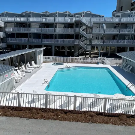 Spectacular partial ocean view 2BR 2BA large top floor condo-beachfront complex!