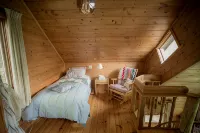 Spiral Staircase Leads To The Lofted Bedroom And Overlooks The Birch Woods. - シャレー