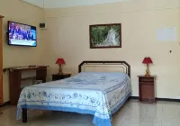 Alpha Villa – Double Room in Flic en Flac - parking