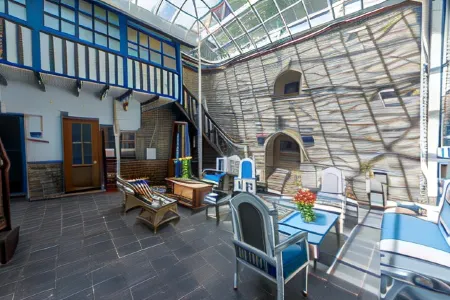 X.O Art House Отели в г. Куско