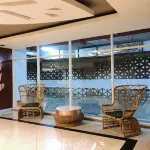 Studio Room with Netflix at Apartemen Grand Kamala Lagoon by Apartemenku