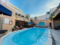 Al Liwan Suites - ที่มีสระว่ายน้ำ
