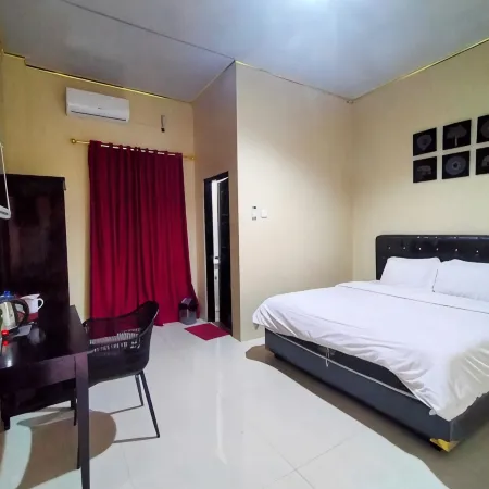 Indah Guest House Отели в г. Соронг