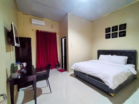Indah Guest House Отели в г. West Sorong