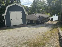 3-bedroom modern mid century cabin! Hot tub, fire pit and lake front