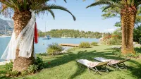 Superb waterfront villa with private pool, jetty, motorboat included and sauna