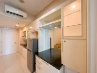Restful and Good Location 1BR Apartment at Trillium Residence By Travelio - Condos