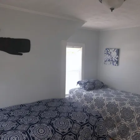 Perfect Pine Point beach house with rooftop deck and private yard!