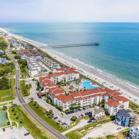 Breathtaking ocean views, resort-style pools, onsite restaurant, steps to beach.