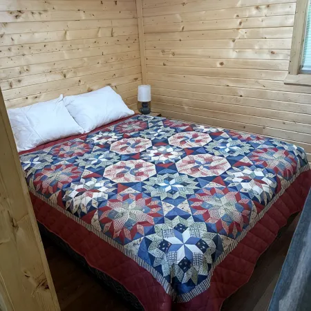 Green cabin close to University of Central Missouri and Whiteman AF Base