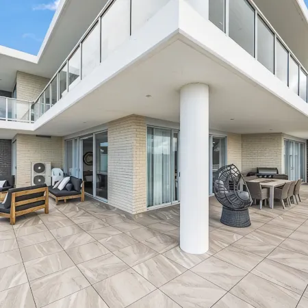 Coastal setting minutes from beach and shops