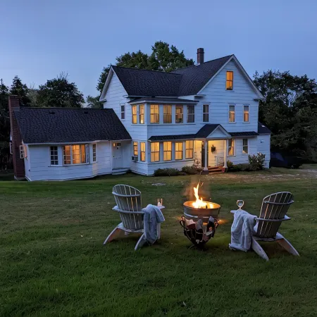 Enjoy comfortable elegance in this secluded grand home located in town
