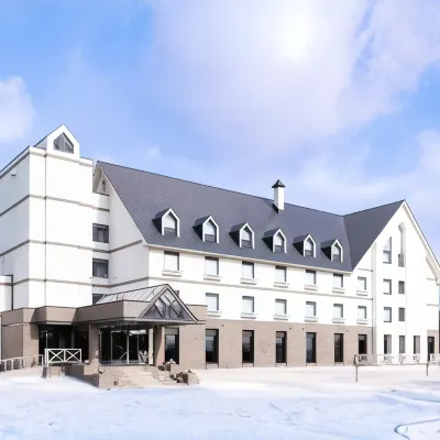 Edel Warme Hotel berhampiran Stesen Furano