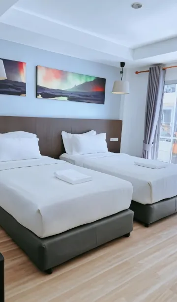 ห้องมาตรฐานเตียงแฝดพร้อมระเบียง